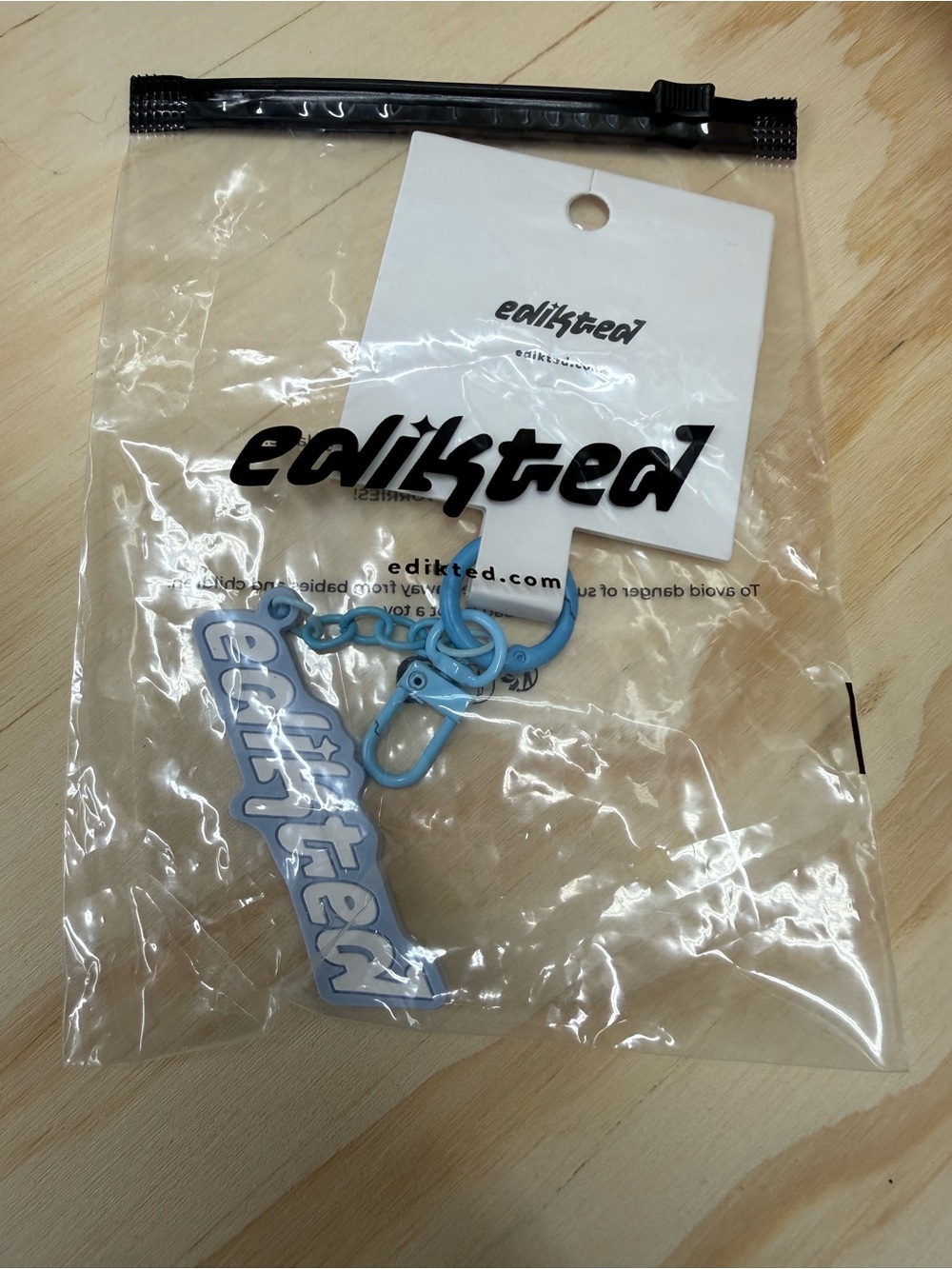 Edikted Light Blue Logo Keychain with Matching Clip